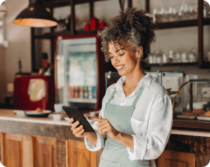 cafe owner on a tablet device