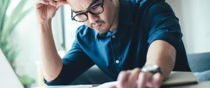 Business Owner Working Through Change Of Tenancy Forms