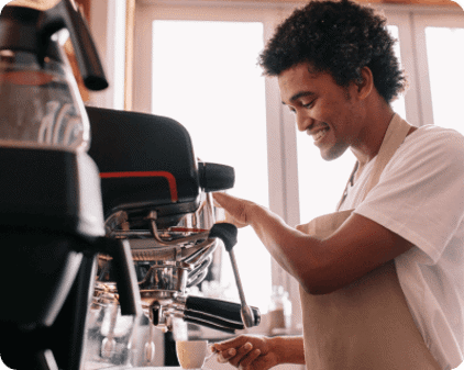 barista making an espresso