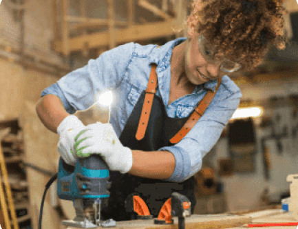 Lady working with power tools on work table