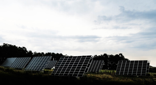 A landscape, showing a bank of solar panels.