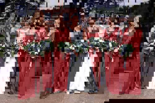 bride with her 6 bridesmaids in red dresses Eleanor Bryant Photography.